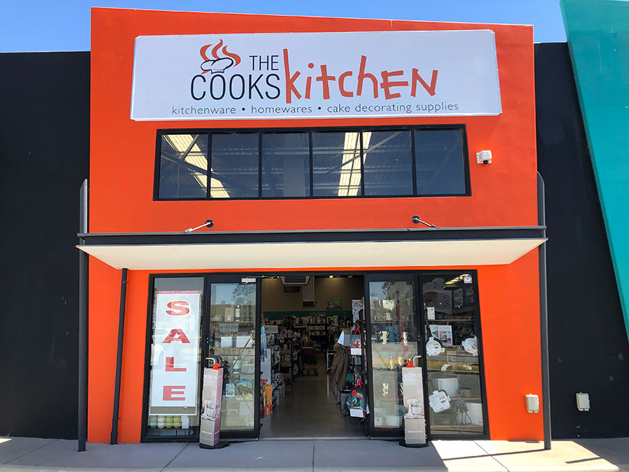 The Cooks Kitchen storefront facade signage